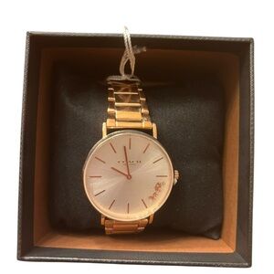 NWT Women’s Coach Rose Gold Watch.